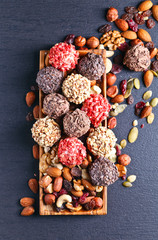 Homemade candy with chocolate , nuts and dried strawberry
