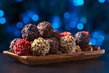 Homemade candy with chocolate , nuts and dried strawberry