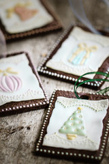 Naklejka premium beautiful homemade christmas cookies on rustic wooden table, selective focus
