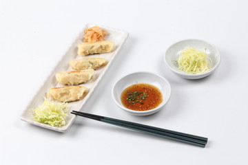 Japanese steamed stuffing flour with pork and cabbage as Gyoza.
