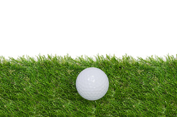 Golf ball on green grass background.