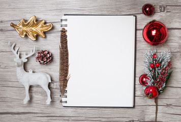 Christmas letter writing on white paper with decorations.