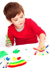 Little boy painting