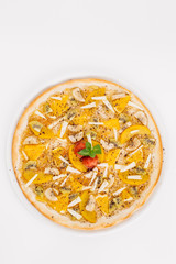 Sweet pizza with fruits on table