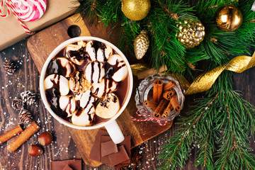 Сup with Christmas hot drink, Candy Canes and gingerbread cookies