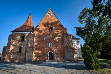 facade of the catholic Gothic church in Poznan.