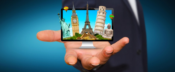 Man travelling the world with his computer