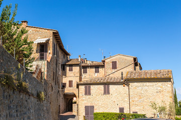 Fototapeta na wymiar San Gimignano, Italy. Old buildings in the historic center