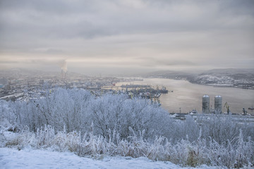 View of the port, the city and the bay from the hill in winter