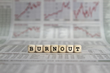 Burnout word built with letter cubes