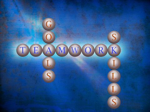Teamwork word cloud writen on balls infront of a wall background