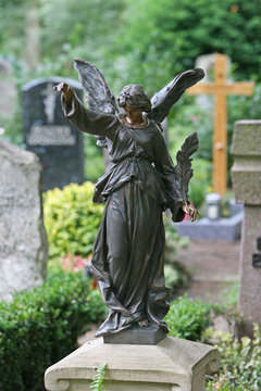 Angel female statue offering blessings