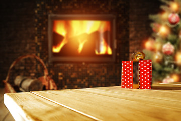 xmas tree fireplace and wooden desk space 