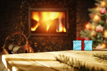 Naklejka na ściany i meble xmas tree fireplace and wooden desk space 