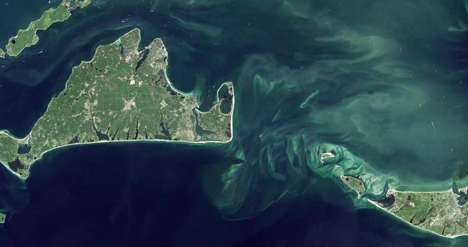 High-altitude overflight aerial of Martha's Vineyard and SW Cape Cod, MA. Clip loops and is reversible. Elements of this image furnished by NASA 