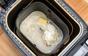 Prepare dough in bread maker