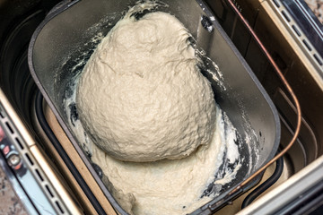 Prepare dough in bread maker