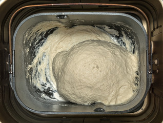 Prepare dough in bread maker