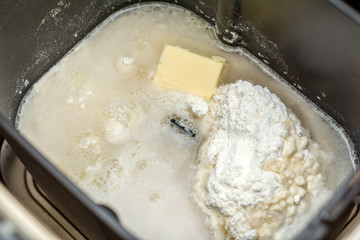 Prepare dough in bread maker