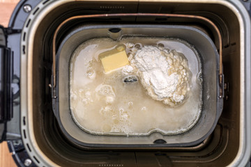 Prepare dough in bread maker
