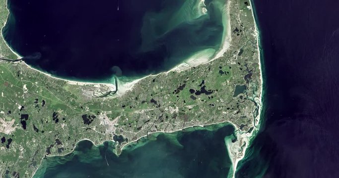 High-altitude overflight aerial of central and east Cape Cod, MA. Clip loops and is reversible. Elements of this image furnished by NASA