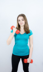 Naklejka premium girl with dumpbells on white background sport concept gym
