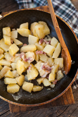 Fried potatoes with bacon