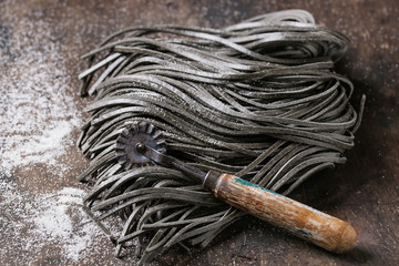Raw black spaghetti pasta