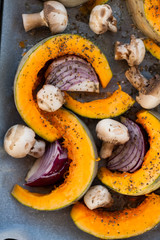 Baked pumpkin with onion and mushrooms