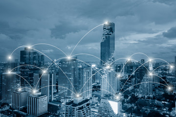 Network business conection system on cityscape background
