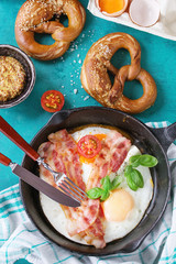 Breakfast with fried eggs and bacon