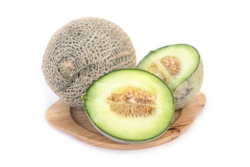Fresh green cantaloupe melon slice isolated on white