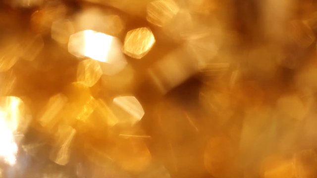 Abstract bokeh golden particles