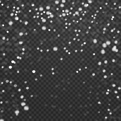 Realistic falling snowflakes isolated on transparent checkered background.
