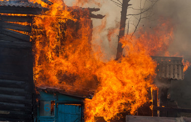 Firefighters extinguish a house
