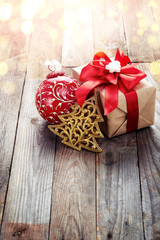Christmas decoration (box,origami christmas tree) over wooden ba