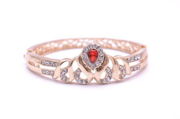 Gold bracelet with diamonds isolated on white