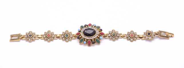 bracelet with precious stones isolated on white