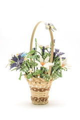 Fototapeta na wymiar Beaded flowers in the basket isolated on white