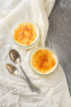 Creme brulee - traditional french vanilla cream dessert with car
