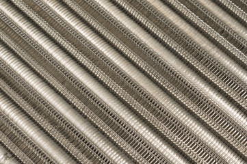 Details of the car engine radiator. Macro close-up of the radiator plates.