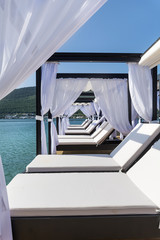 Beach lounge - Sundecks above the sea .Summer holiday concept