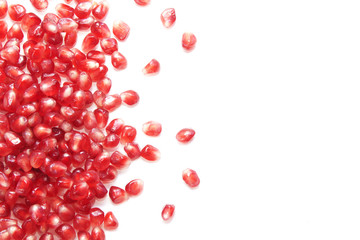 Background of red pomegranate (garnet) fruit seeds