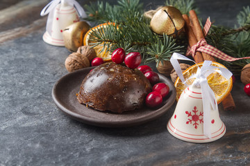 Christmas chocolate pudding with cranberries, walnuts, cinnamon,