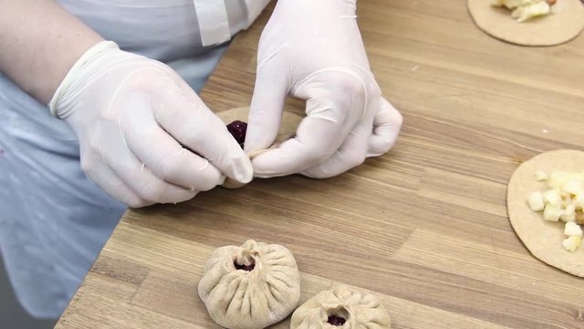 Preparation dough for baking small cakes with cherries