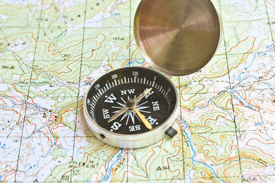 Symbols of travel - map with compass.