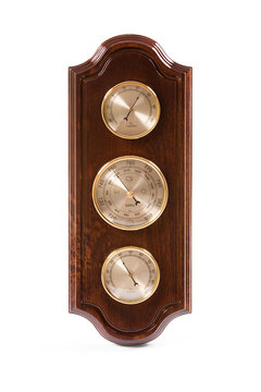 Vintage wooden wall barometer on a white background