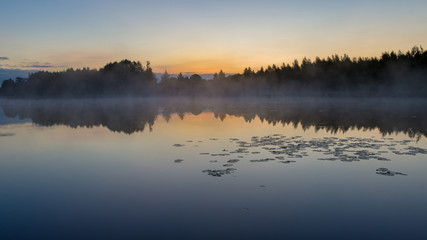 Obraz na płótnie Canvas Foggy lake in the morning, Belarus, Summer