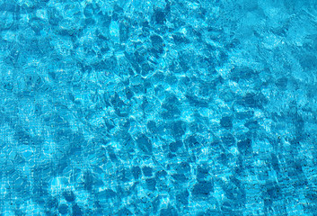 Blue ripped water in swimming pool