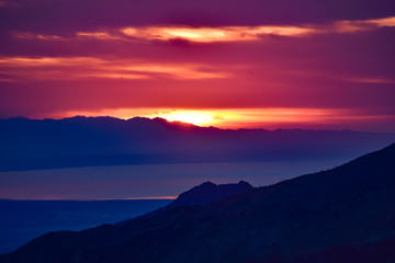 Sunrise overlooking the lake from a mountain top